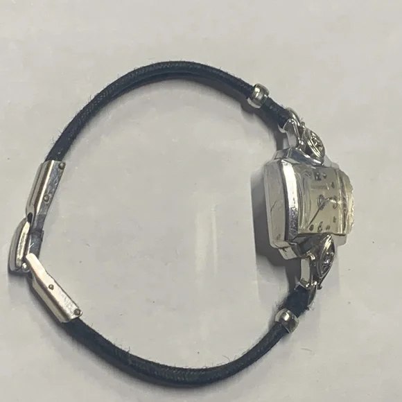 14k and diamonds Longines women watch
